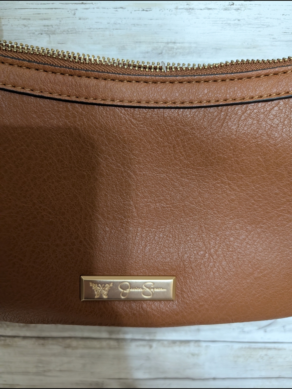Jessica Simpson Cognac Leatherette Wristlet with Gold Plaque